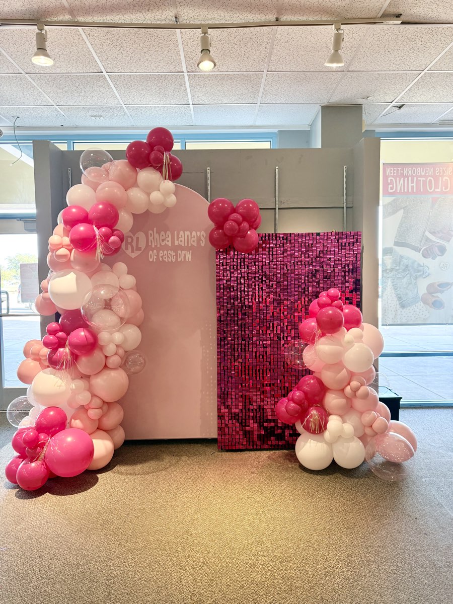 Beautiful pink balloon arch with shimmer backdrop by The Greeting Fairy