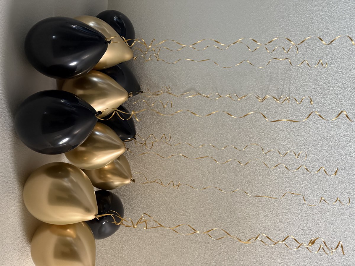 Black and gold balloon arrangement
